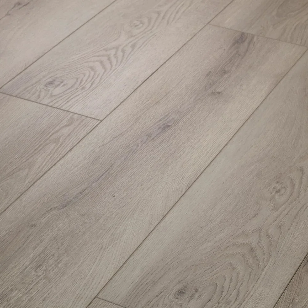 Photo of light-colored wooden floor planks with natural wood grain patterns.