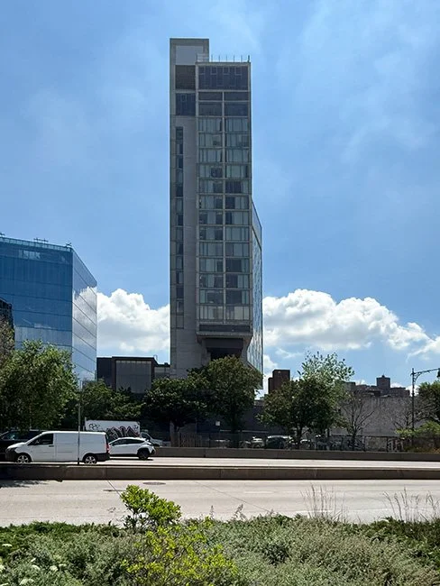 The Standard Hotel by Polshek Partnership, now known as Ennead Architects cantilevered over the High Line in New York City.