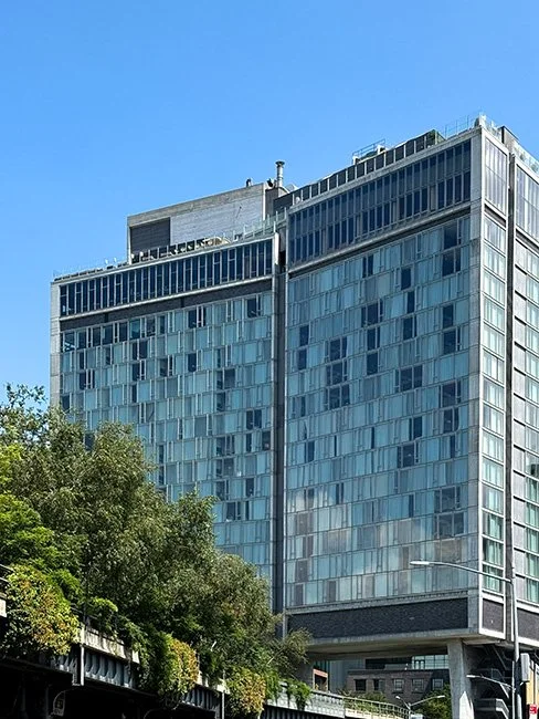 The Standard Hotel by Polshek Partnership, now known as Ennead Architects cantilevered over the High Line in New York City.