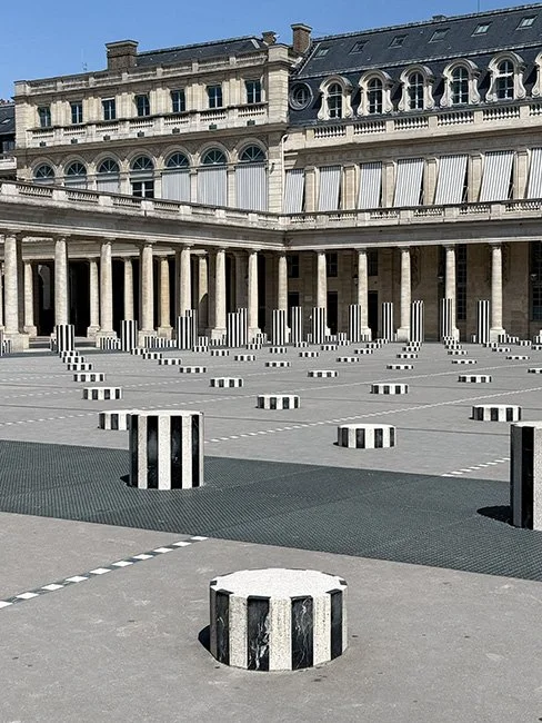 Colonnes de Buren by Daniel Buren in Paris France.
