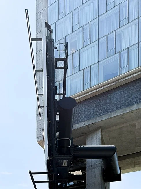 The Standard Hotel by Polshek Partnership, now known as Ennead Architects cantilevered over the High Line in New York City.