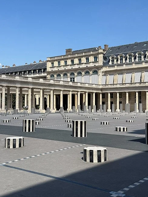 Colonnes de Buren by Daniel Buren in Paris France.
