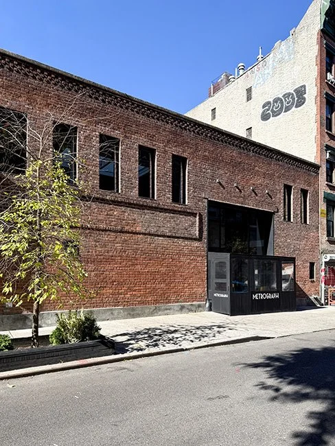 Front view of the Metrograph Theater building in New York City.