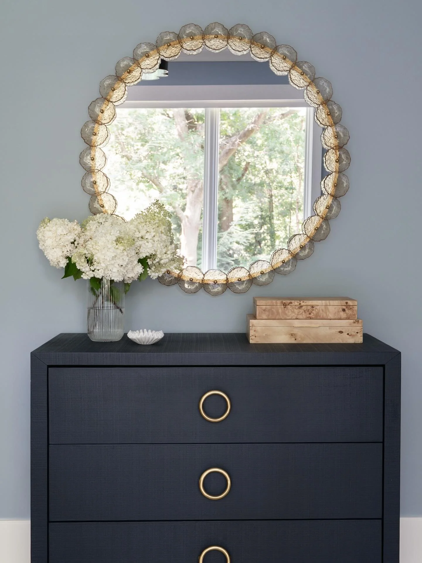 Who said dressers are just for storage? This navy blue chest wrapped in textured linen sets the tone for simple styling that makes a statement.

Photography: @traci.shupert 

#huesofblue #primarybedroom #stylinginspo #luxurydesign #bedroomdesign #mid