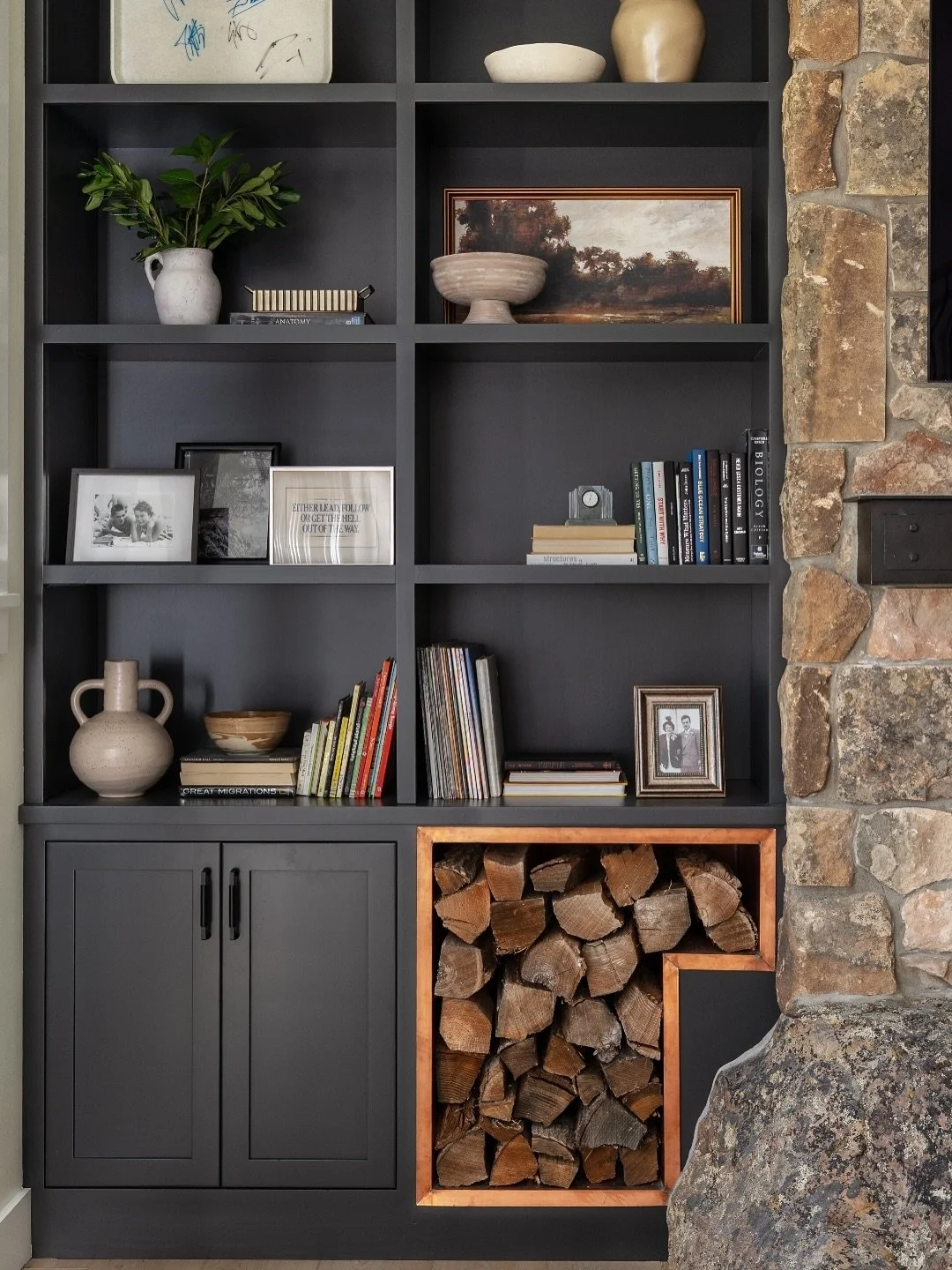 Just in time for fall: stone, wood, and copper layered with warmth ✨ A cozy new project made for the Midwest months ahead. 🍂

Photography: @traci.shupert 

#fireplacedesign #luxurydesign #midwestinteriors #midwestdesign #copperdetails #greatroomgoal