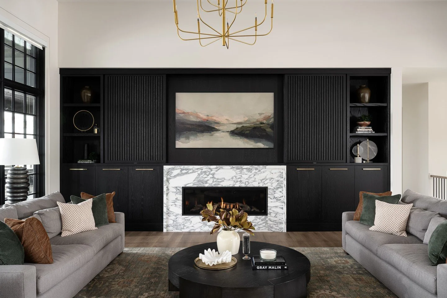 The Great Room - a space for conversation, entertaining, and relaxing. These custom built-in cabinets feature reeded sliding doors to conceal the television when not in use; swipe to see the magic happen! 👀

This one really is just that, great! 😉

