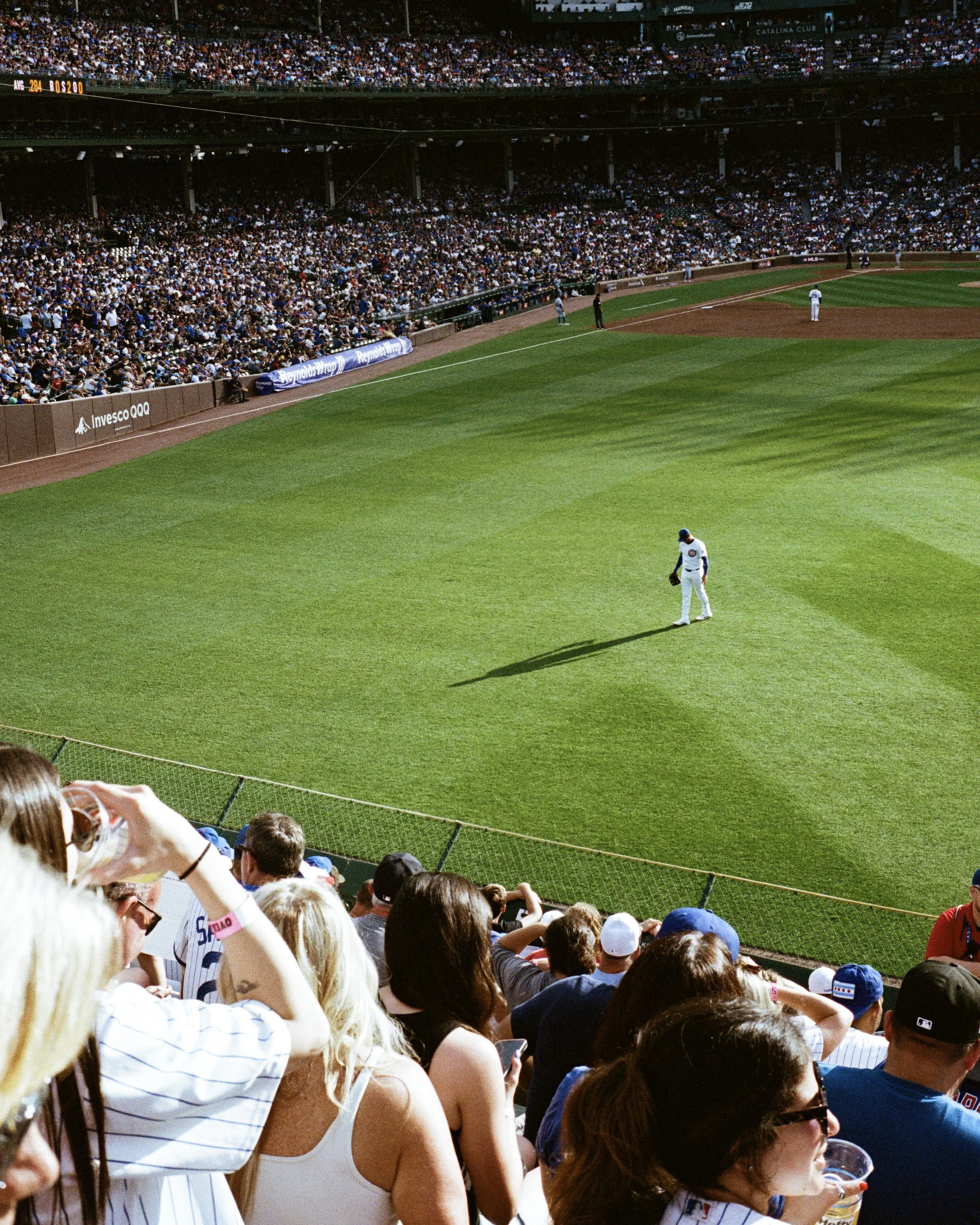 Wrigley Field from the bleachers at golden Hour.