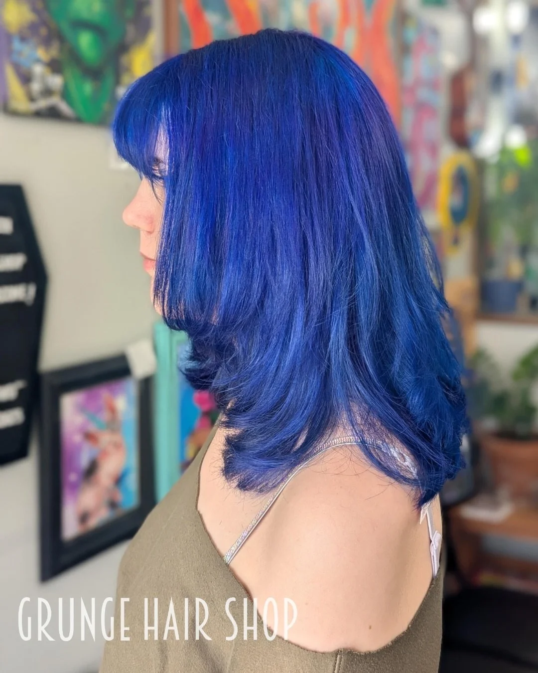 Vibrant blue that actually lasts, cut with those perfect, face-framing layers. 💙 This is why you book with an expert like @glazed_looks for your vivids.

Ready to commit to the color? We&rsquo;ve got you. Book your vivid transformation online.

📍 G