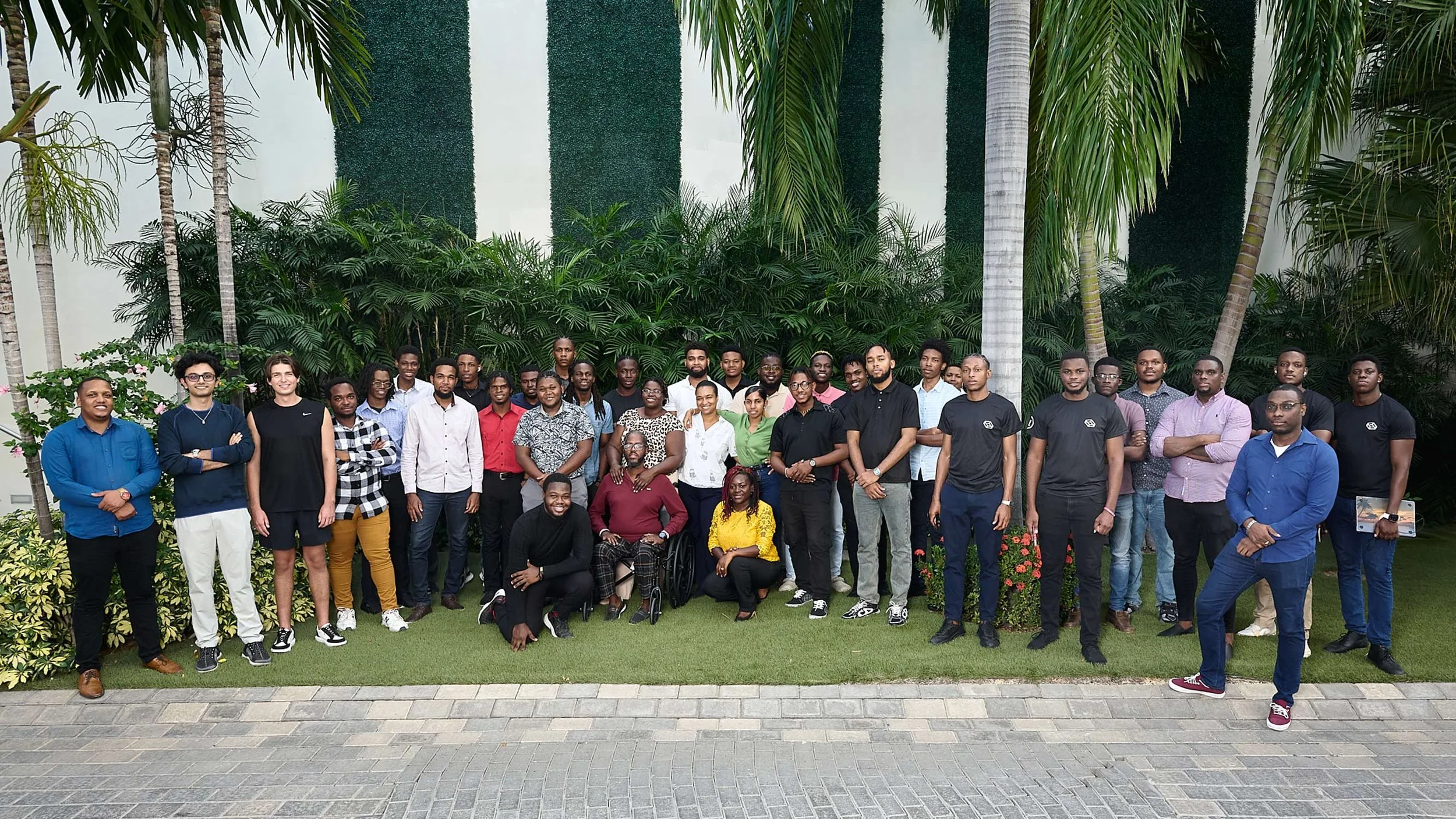 Photo session in Jamaica for an entire team, photographed in an outdoor setting with groups and individuals shots