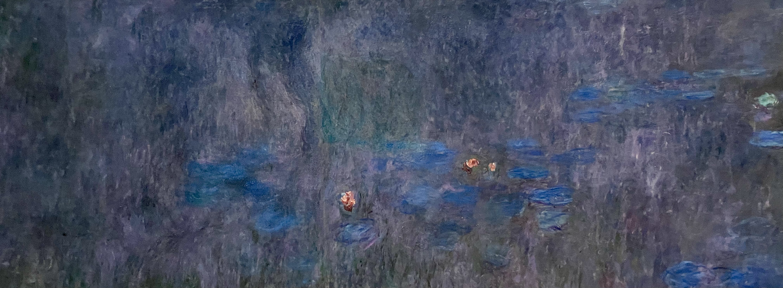 Close-up of a painted water lily pond with pink water lilies and blue water lilies on a blue and purple background.