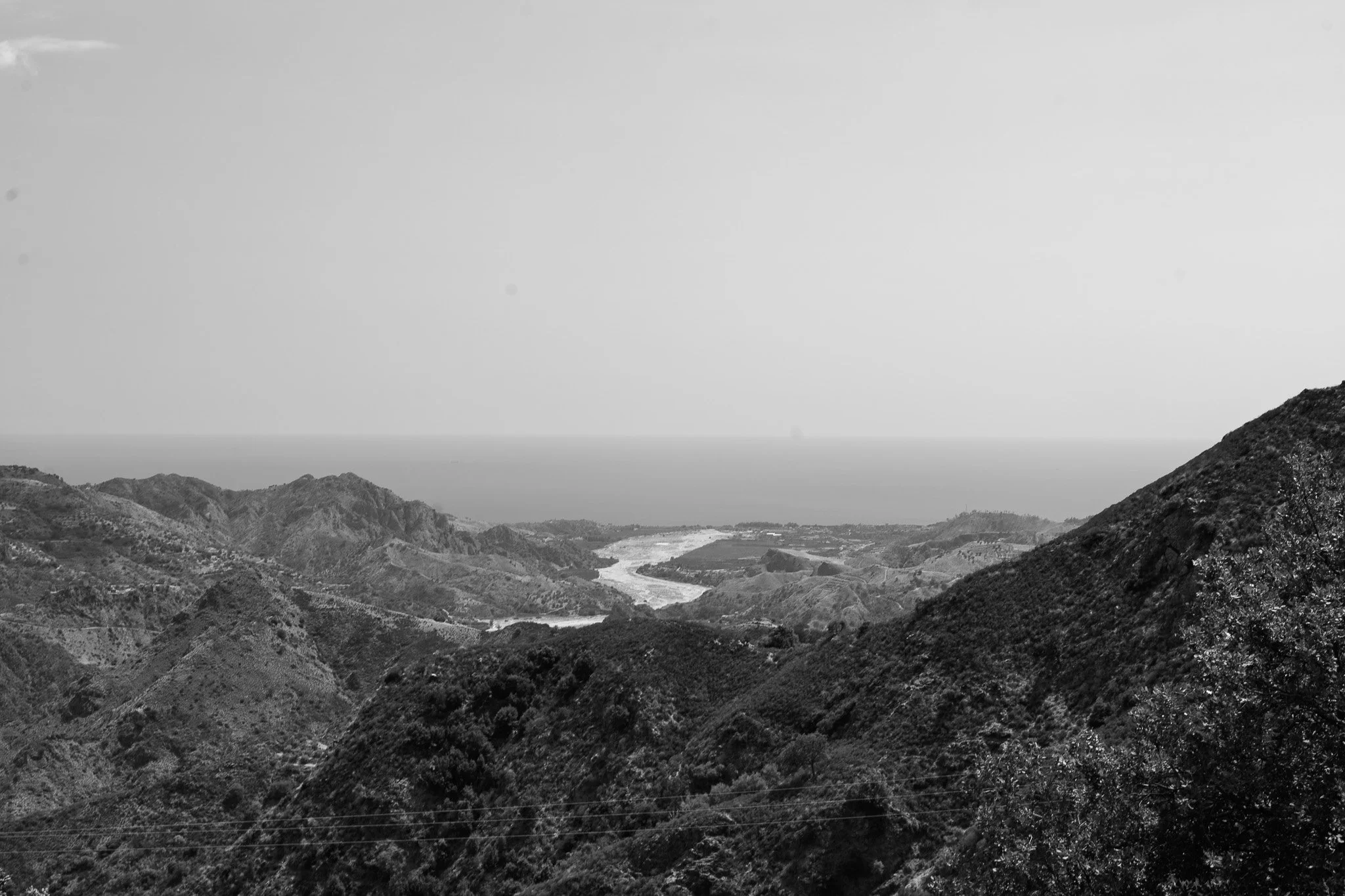 Amendolea river in dry, looking toward the Ionian Sea