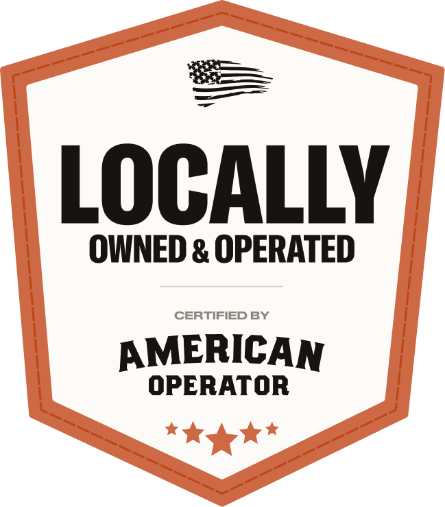 A badge with a brown border stating 'Locally Owned & Operated,' certified by American Operator, with an American flag graphic at the top and five stars at the bottom.