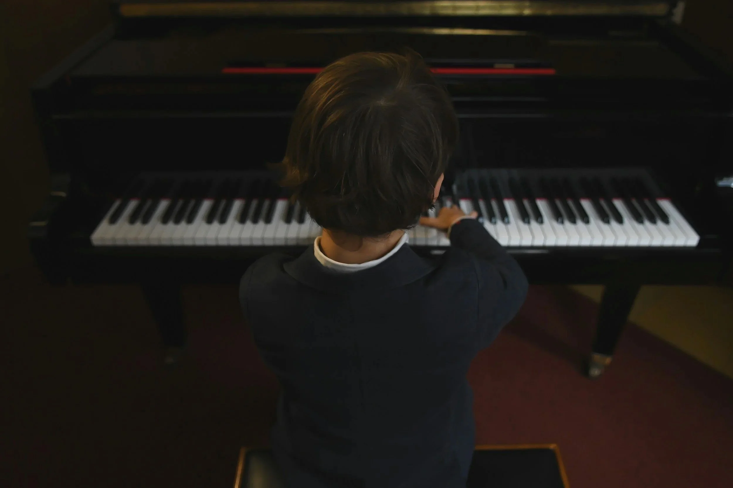 Young student practicing after lessons to play piano at Hashtag Music Academy Hillsborough NJ