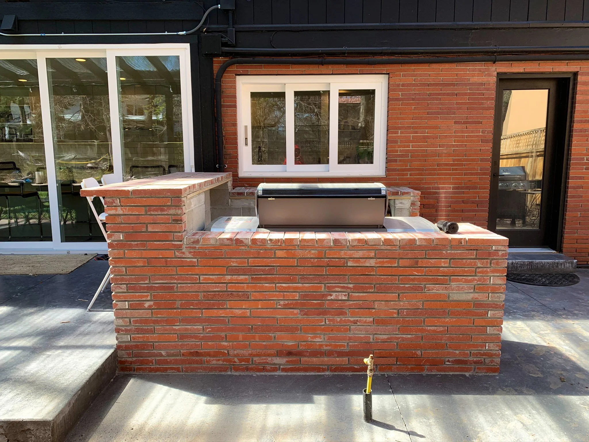 Finished brick outdoor grill