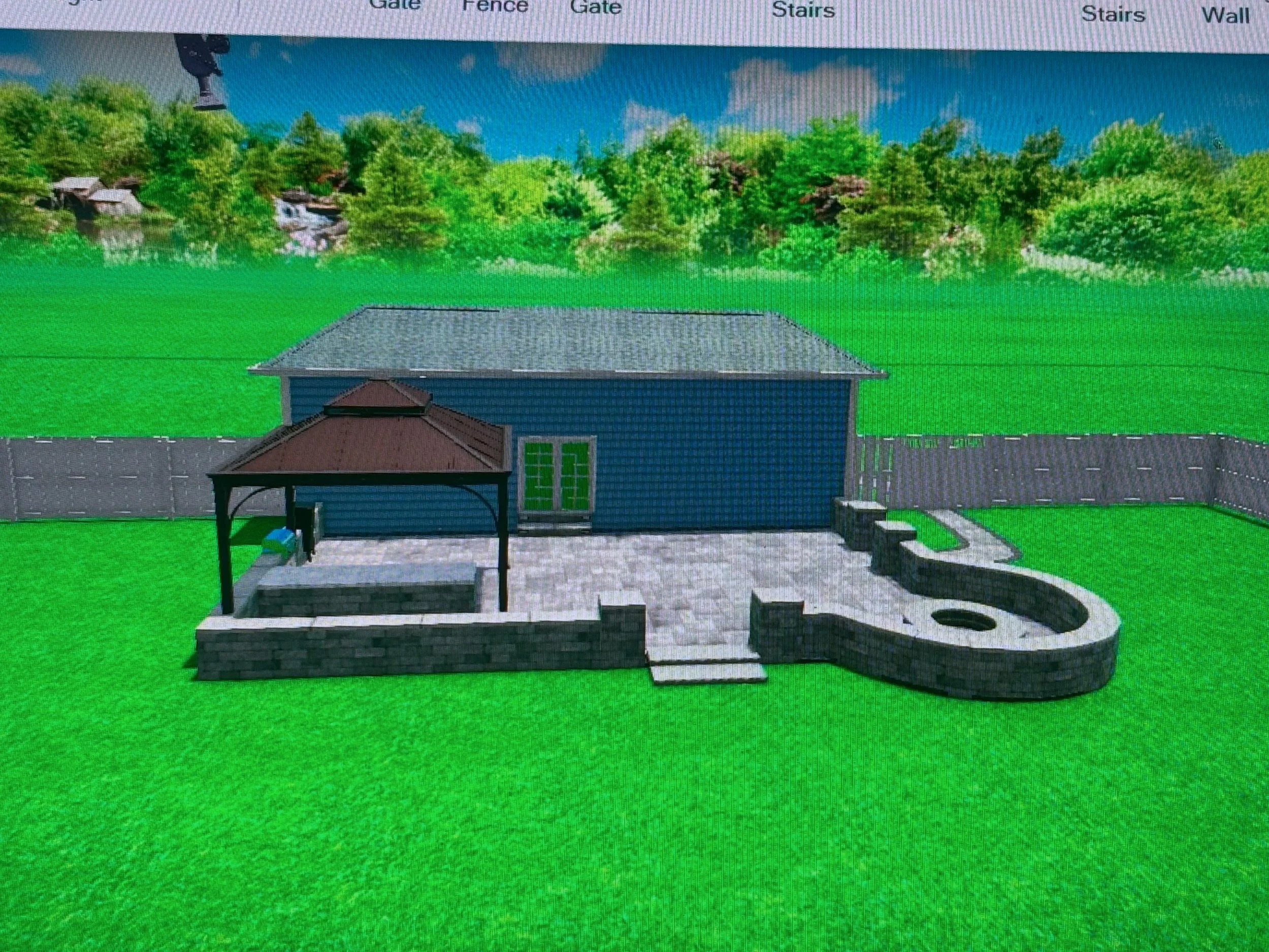 A backyard with a blue house, a patio, a covered area, a small garden, a curved retaining wall, and a green lawn. In the background, there are trees and a blue sky.