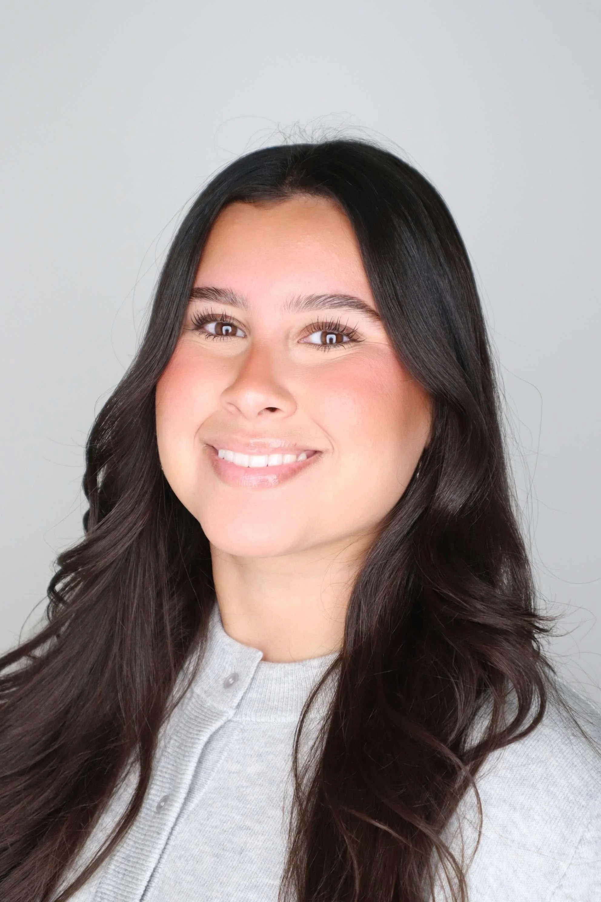 an image of Devyn Escobar smiling at the camera
