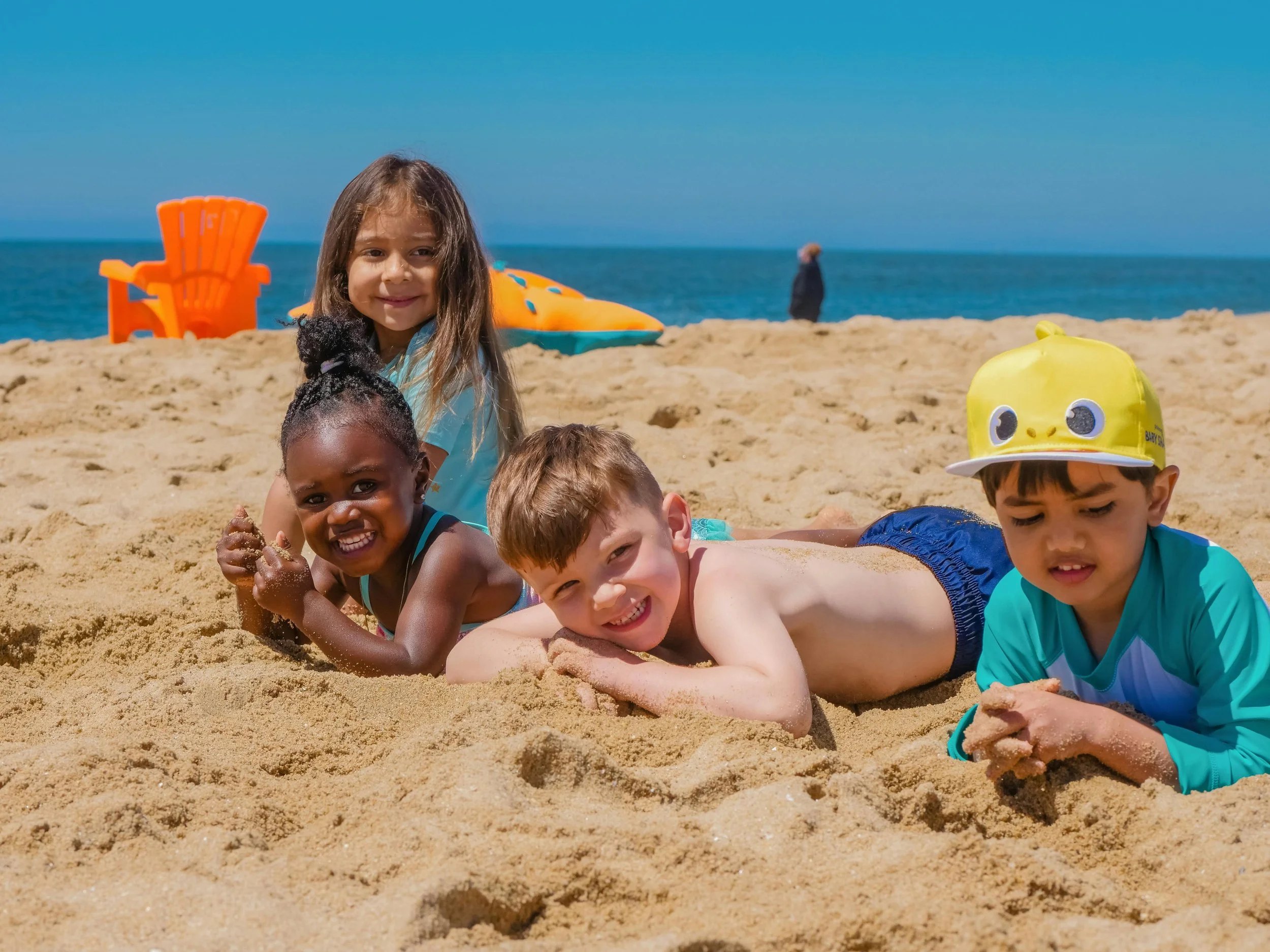children playing on the beach