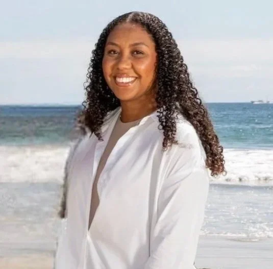 an image of Teyah Holliday smiling at the camera