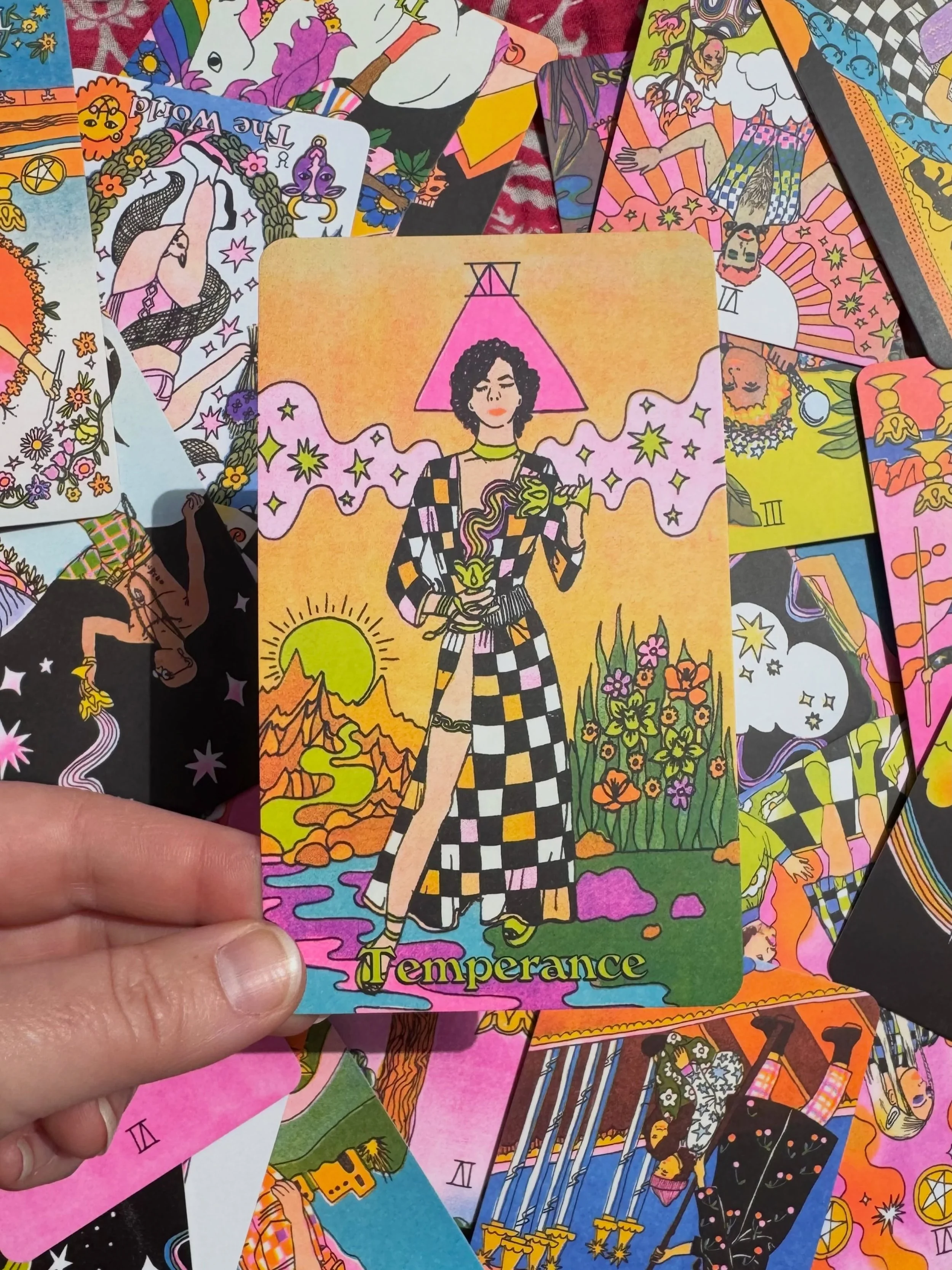 temperance is a card for the girls, gays, and theys 💅🌈🦄

featuring an androgynous angelic figure who exists beyond the confines of gender, this card reminds us to embrace liminal spaces, find the gray within absolutes, and stay grounded while cont