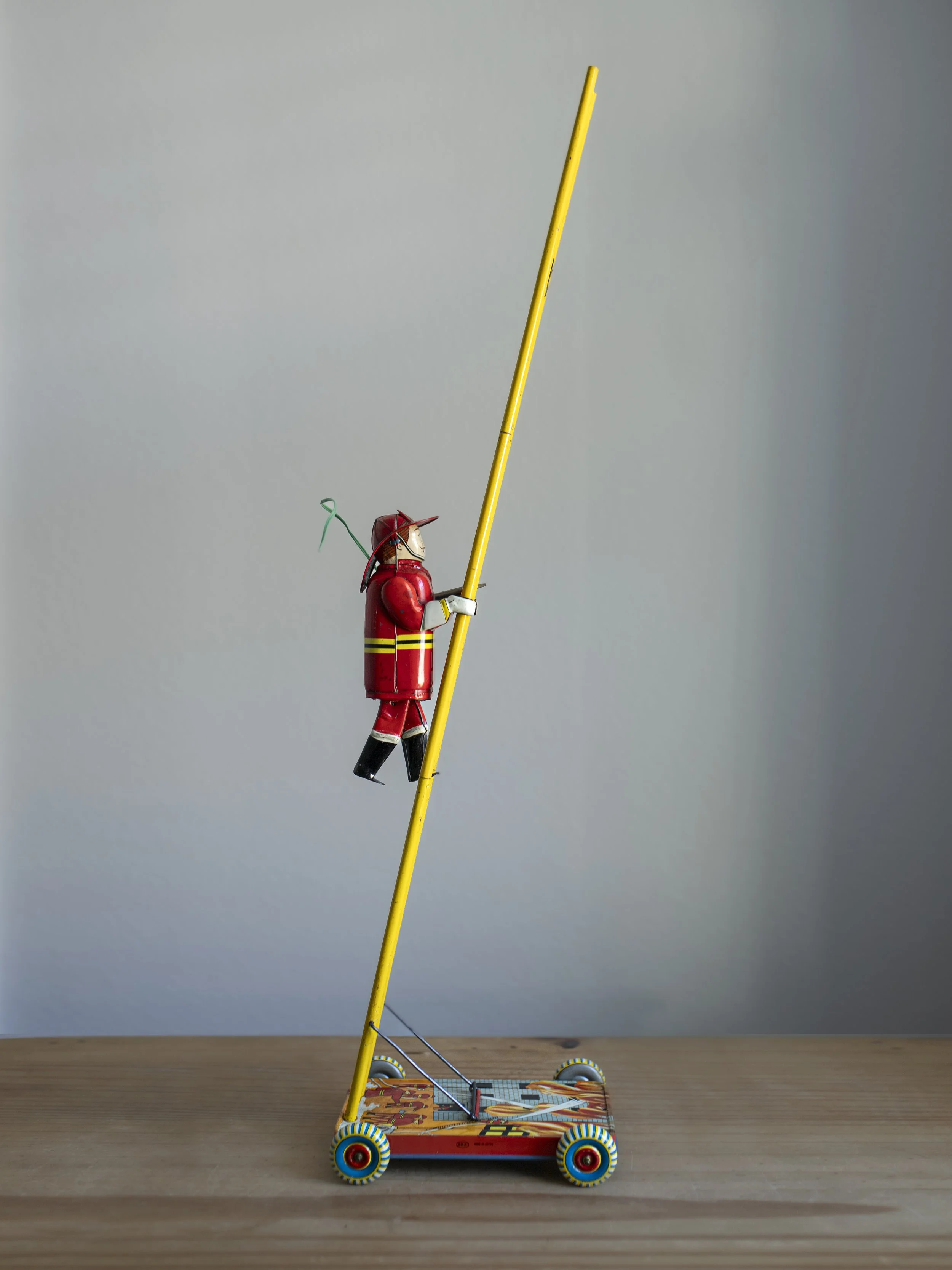 1950s Battery Operated Tinplate Walking, Climbing Fireman