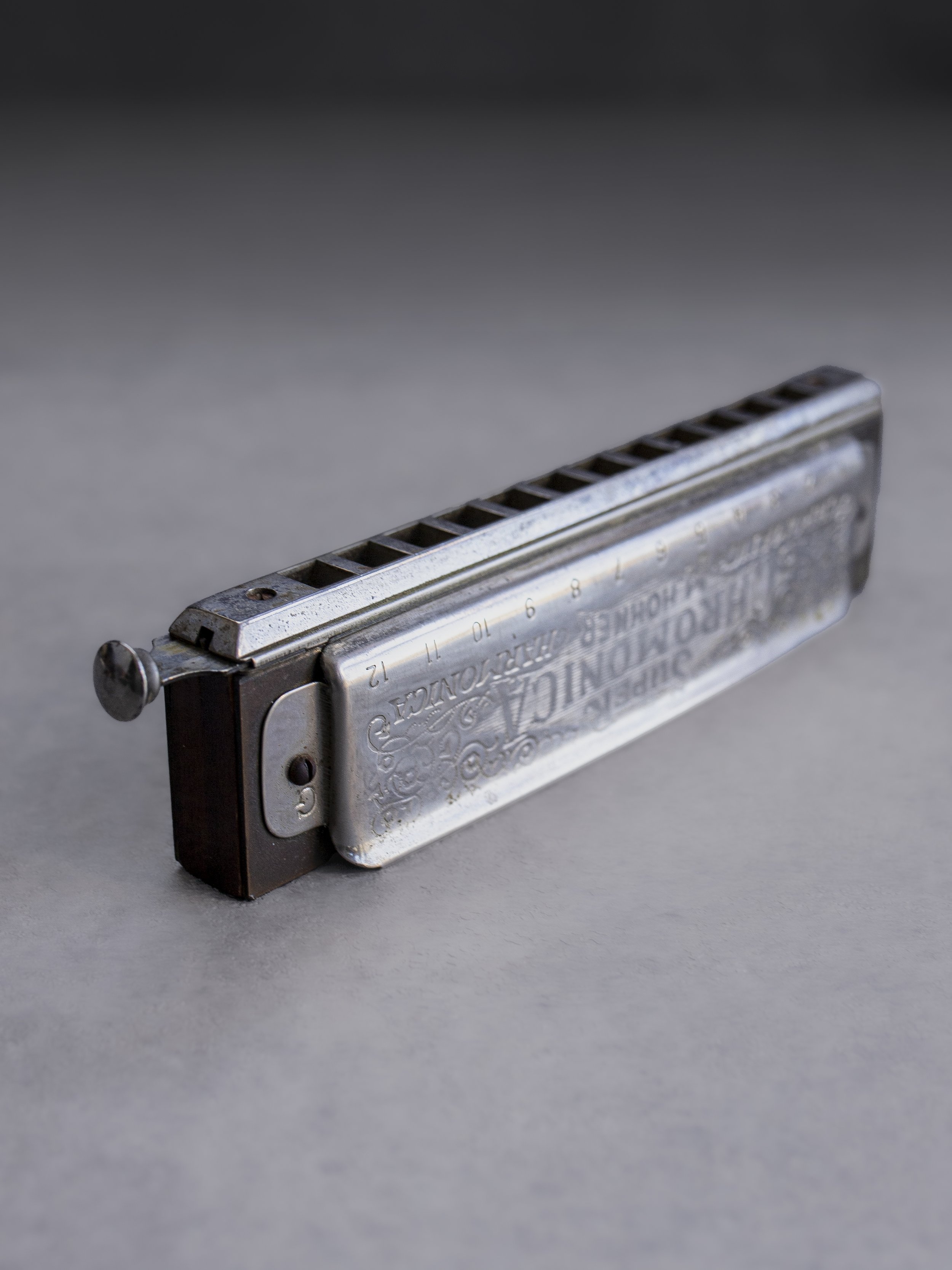 1930s Hohner Super Chromonica Harmonica Key of G Side view