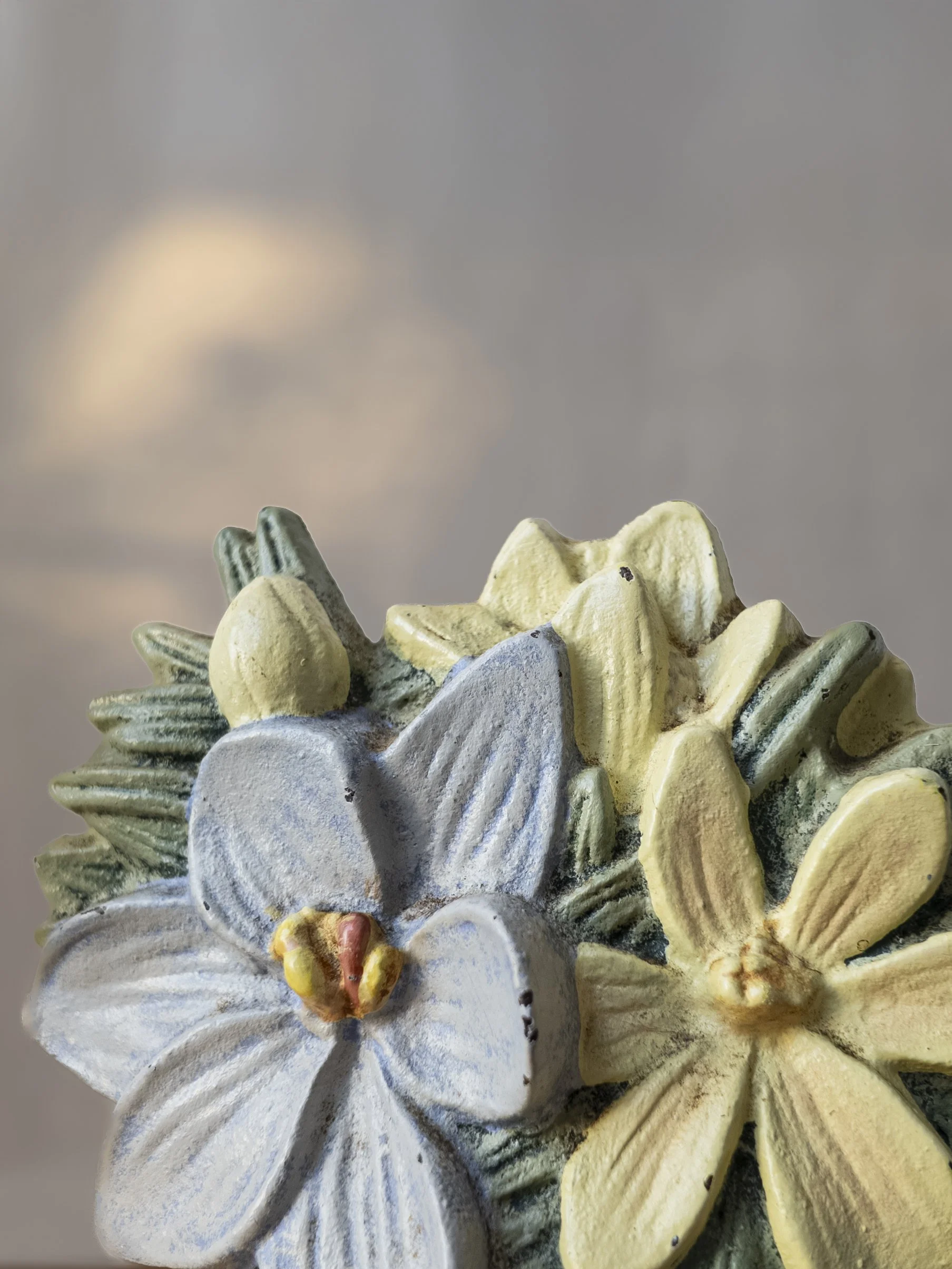 Close-up 1970s Marjolein Bastin Floral Cast Iron Door Stop