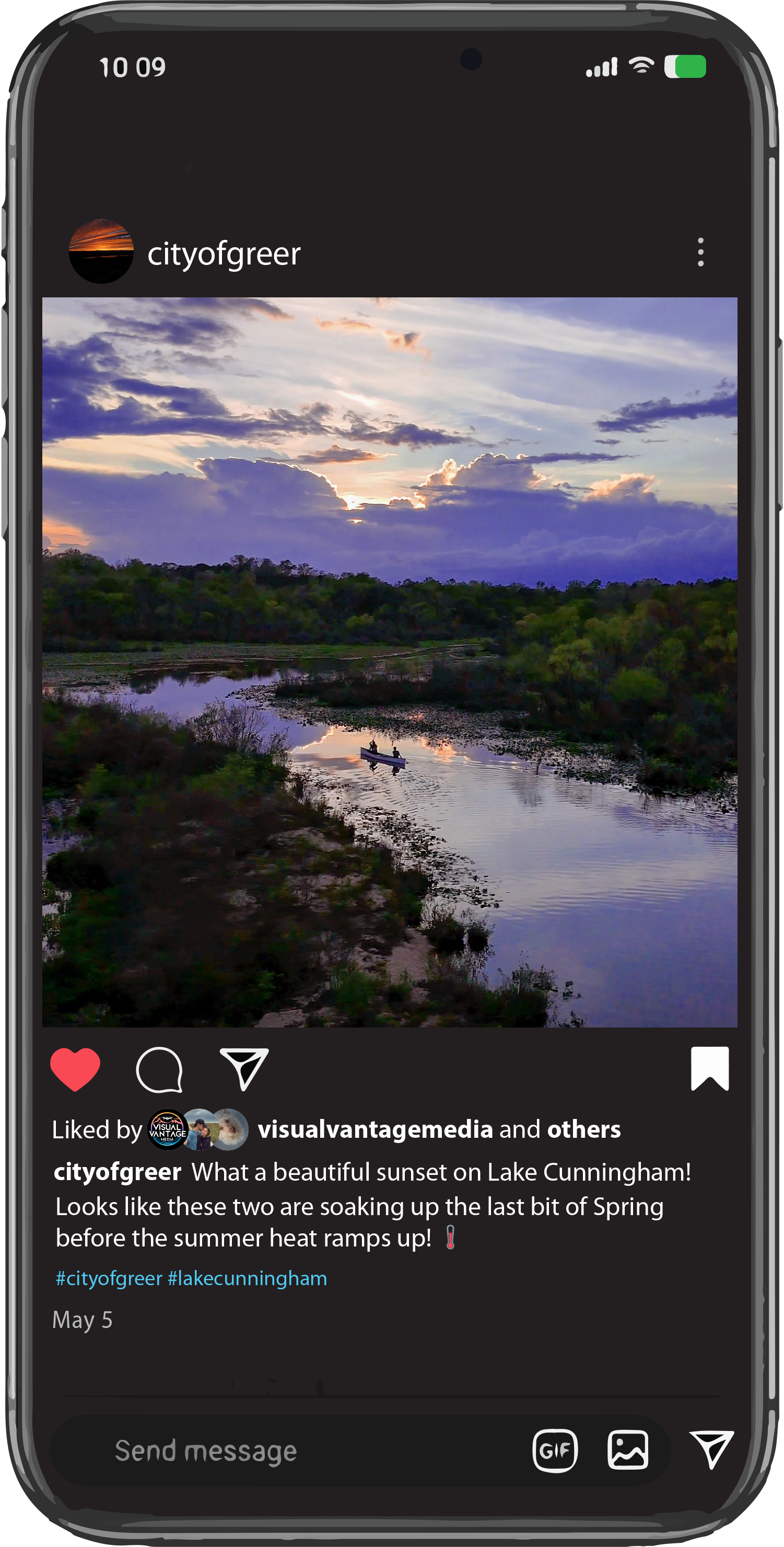 An Instagram screenshot of a landscape photo of Lake Cunningham during sunset, with partly cloudy sky, reflecting in the calm water, and two people in a boat on the lake.