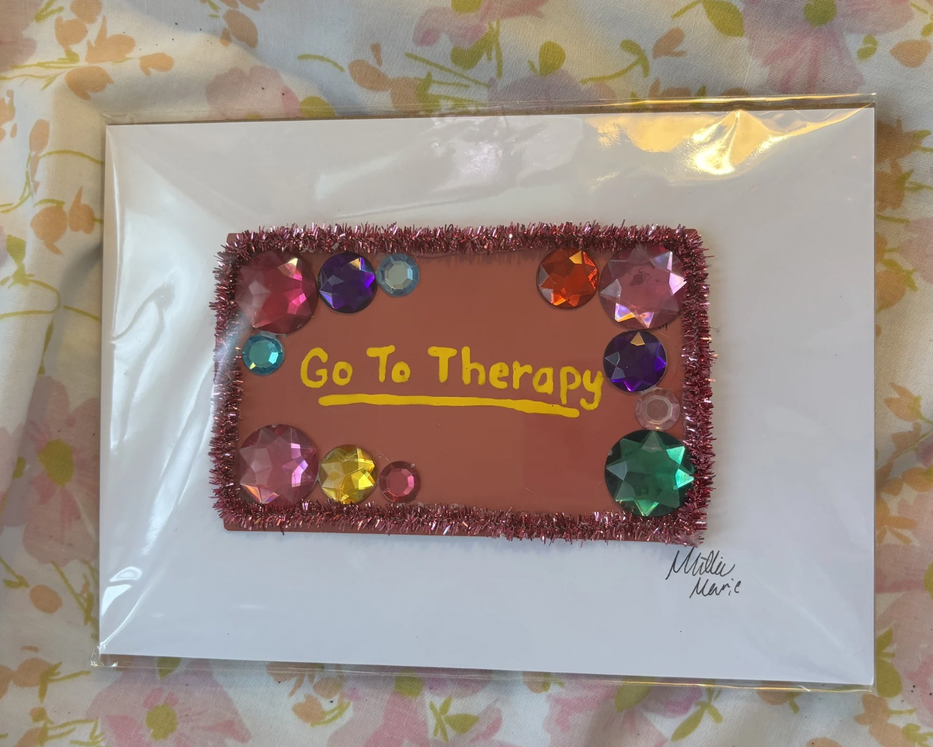 "A Good Idea" /

March 2025 / 
Materials: Paint card, craft gems, pipecleaner, acrylic paint