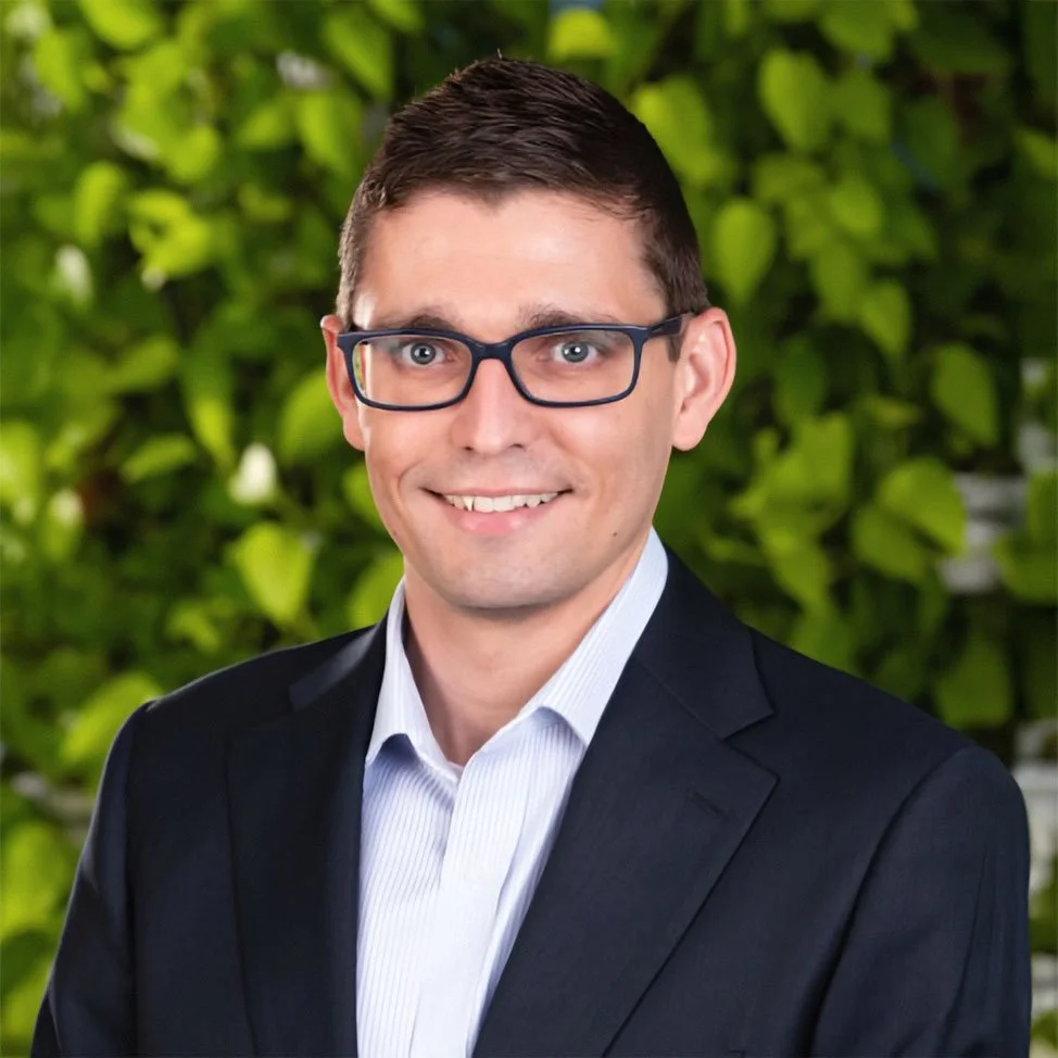 Todd van Wyk, Chief FInancial Officer of Lighthouse, smiling outside.