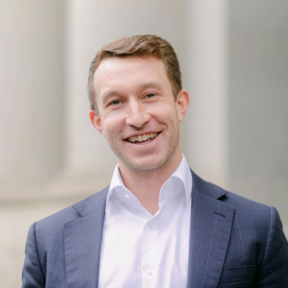 Hayden O’Kelly, Head of M&A at Lighthouse, standing outside.