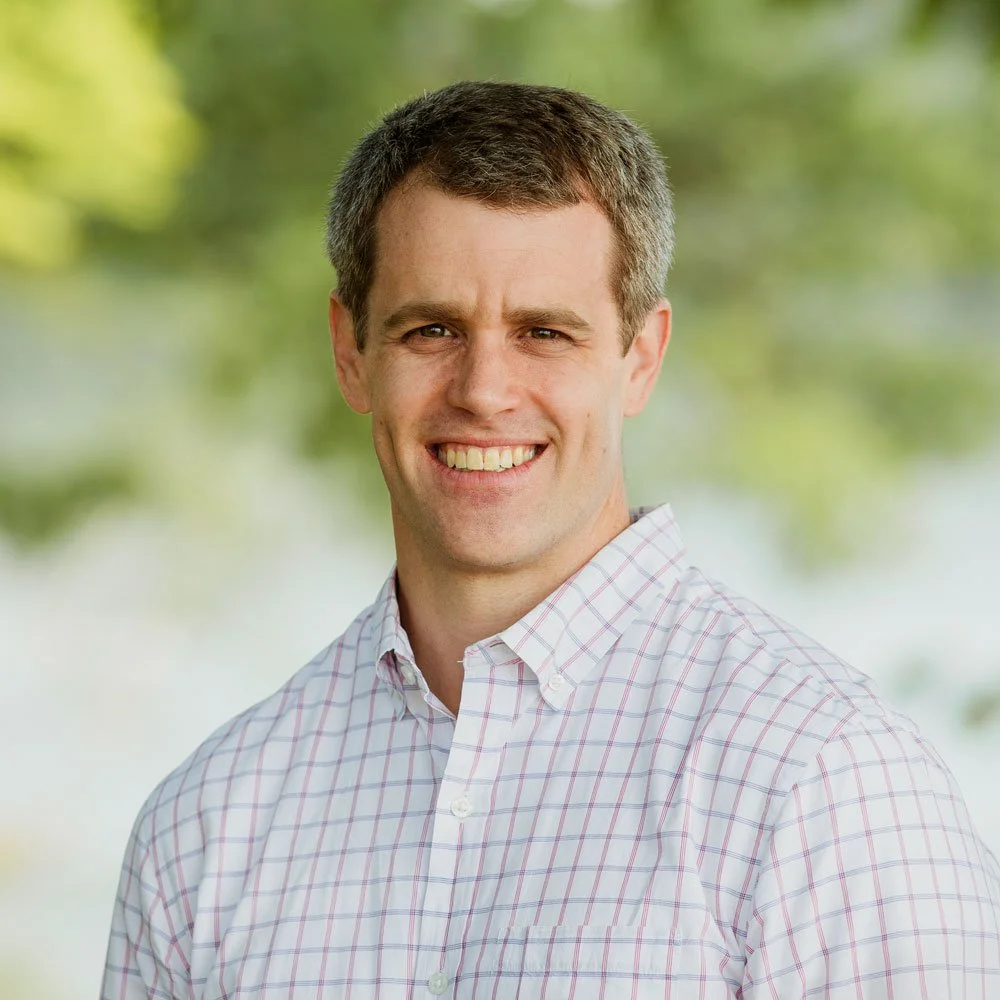 Brad Wilson, Chief Executive Officer of Lighthouse, smiling outdoors.