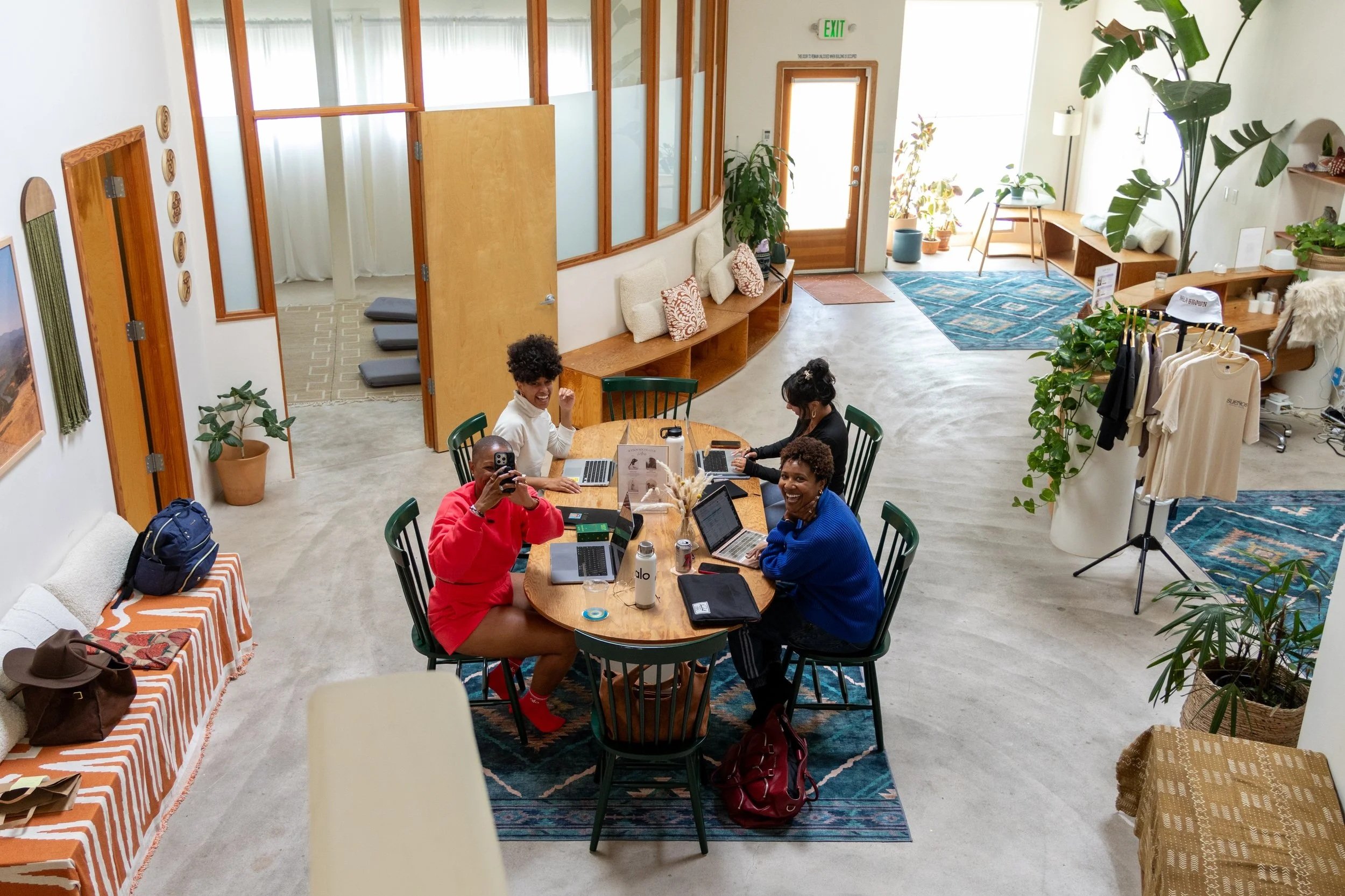 Wellness event venue with lofted ceilings and skyline views for Full Venue in Mid-City Los Angeles — Sueños Social Club. Latino owned venue, BIPOC studio