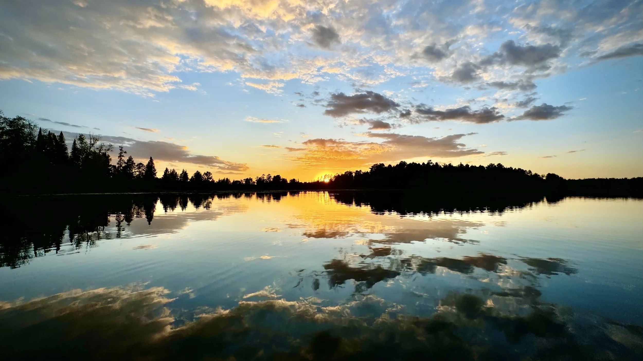A sunset over a lake