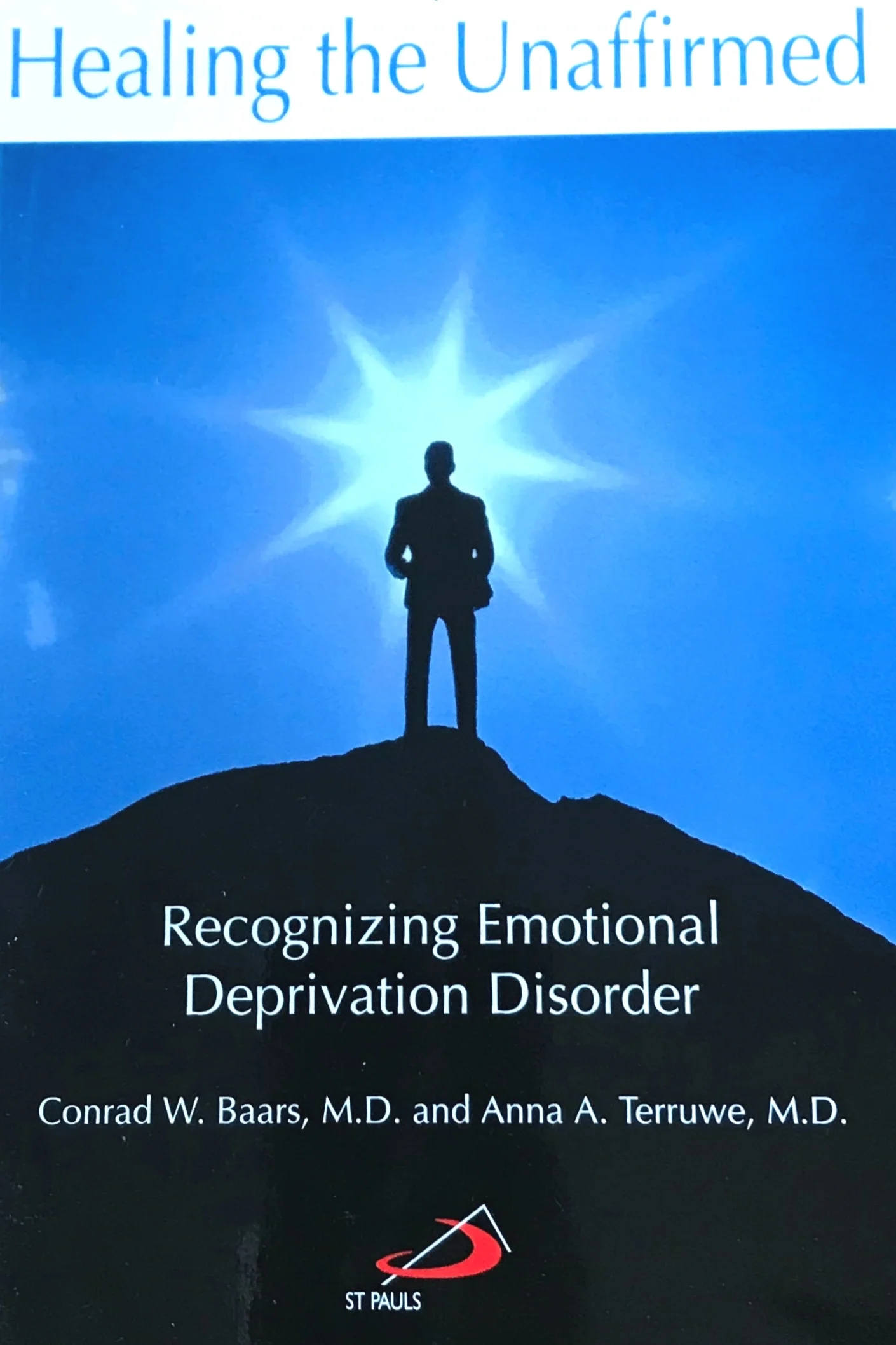 Book cover titled "Healing the Unaffirmed" featuring a silhouette of a person standing on a hilltop against a bright blue sky with a glowing starburst behind them. Subtitle reads "Recognizing Emotional Deprivation Disorder." Authors are Conrad W. Baa