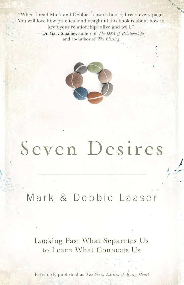 Book cover titled 'Seven Desires' by Mark and Debbie Laaser, featuring a circle of colored stones or pebbles and a quote from Dr. Gary Smalley at the top.