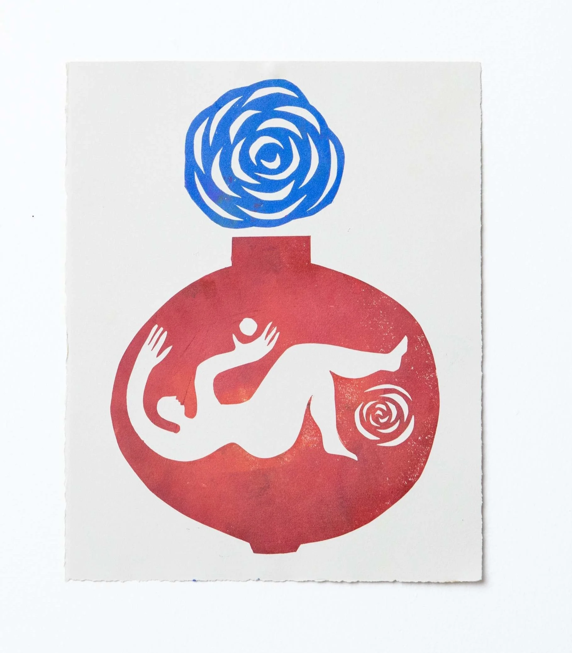 Pomegranate-shaped vessel with human figure inside and blue flower blooming out.