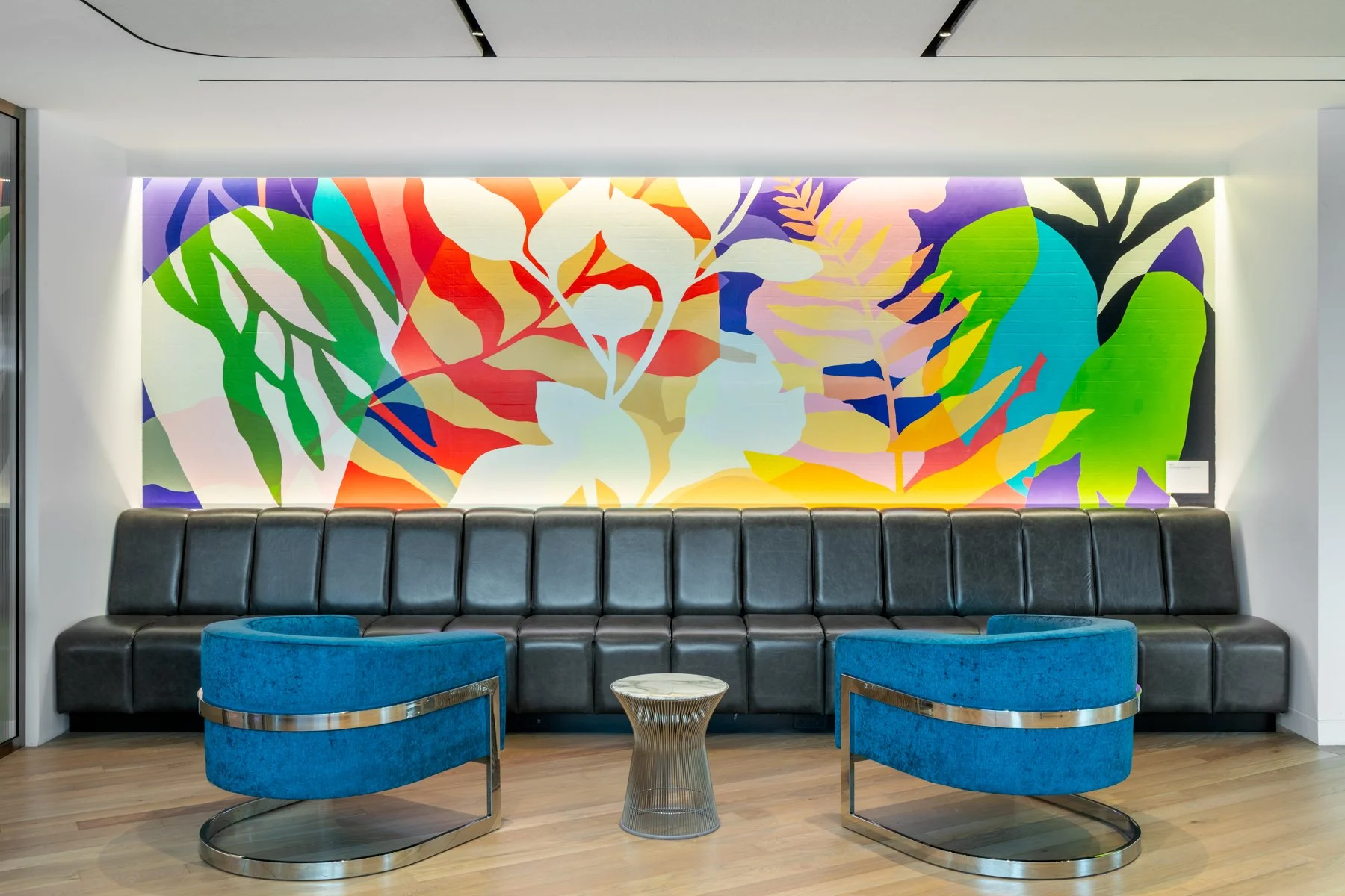 Bold mural with colorful abstract leaves