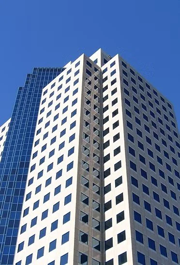 Modern skyscraper with blue sky background