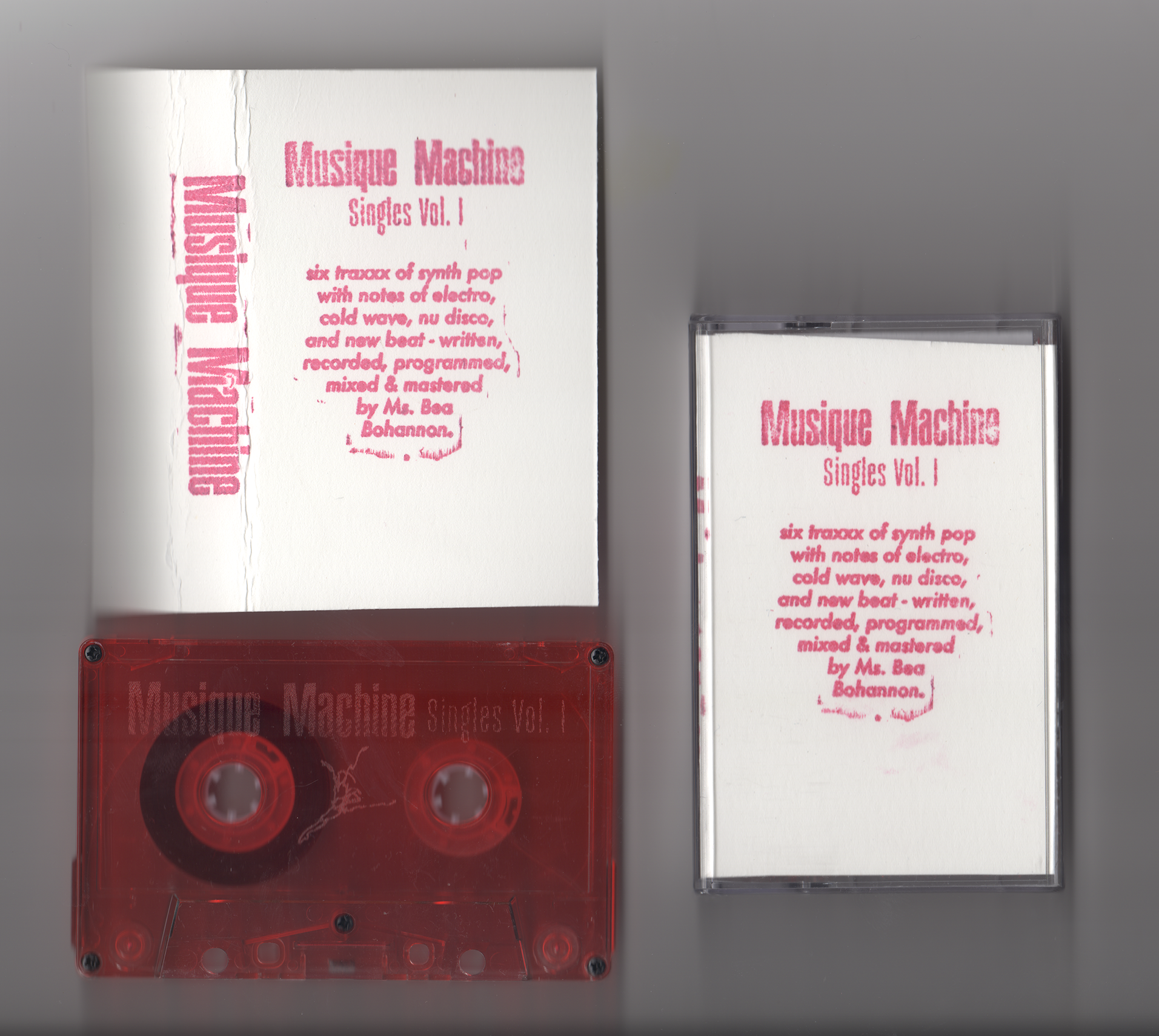 Printed Jcard next to engraved red cassette