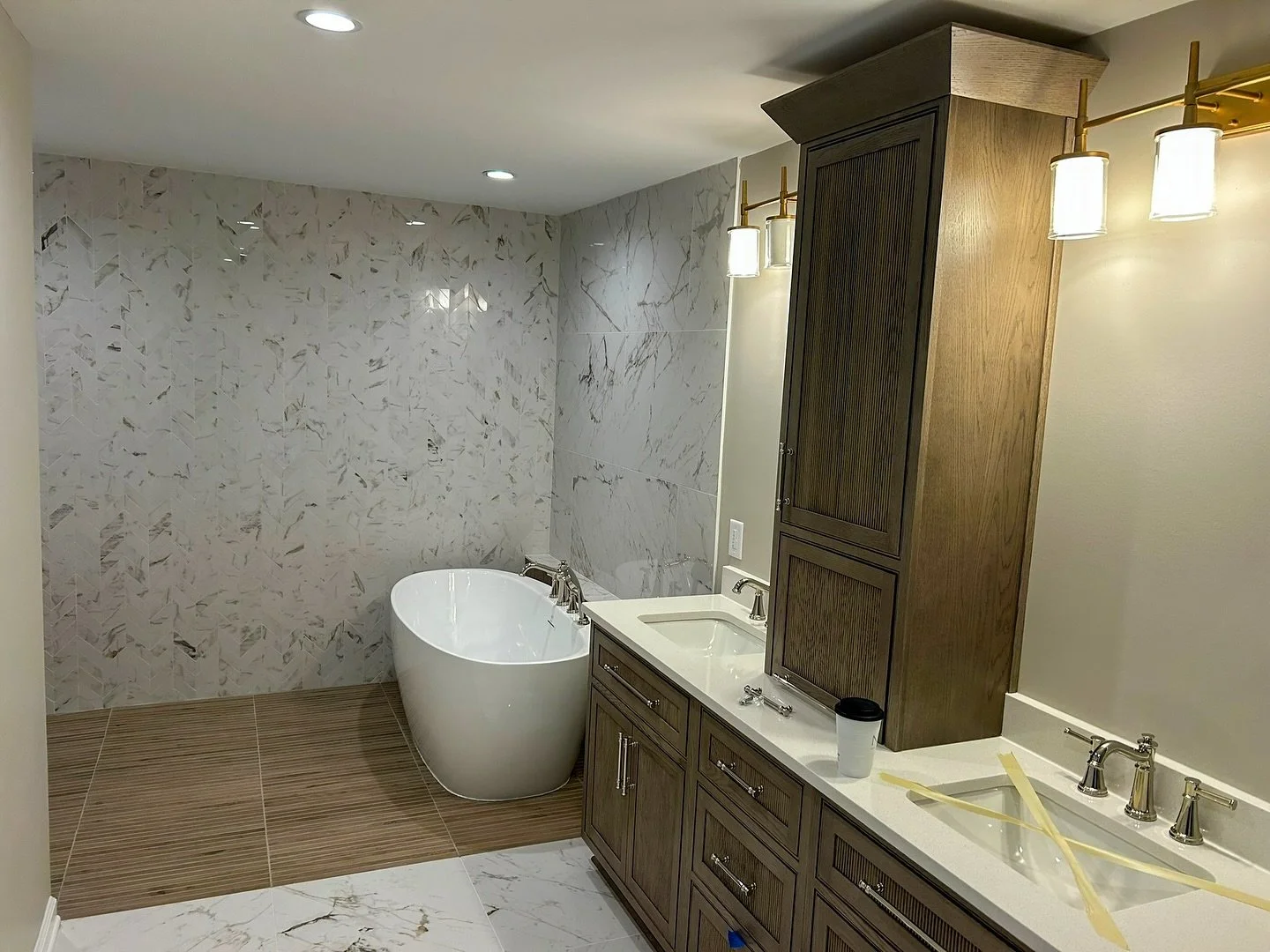 More from this beautiful bathroom revamp in Nashville ✨

We added a new vanity with a center tower and a freestanding tub in the wet room. Don&rsquo;t miss the shower transformation earlier in our feed!

#bathroomremodel #nashvillecontractor #bathren