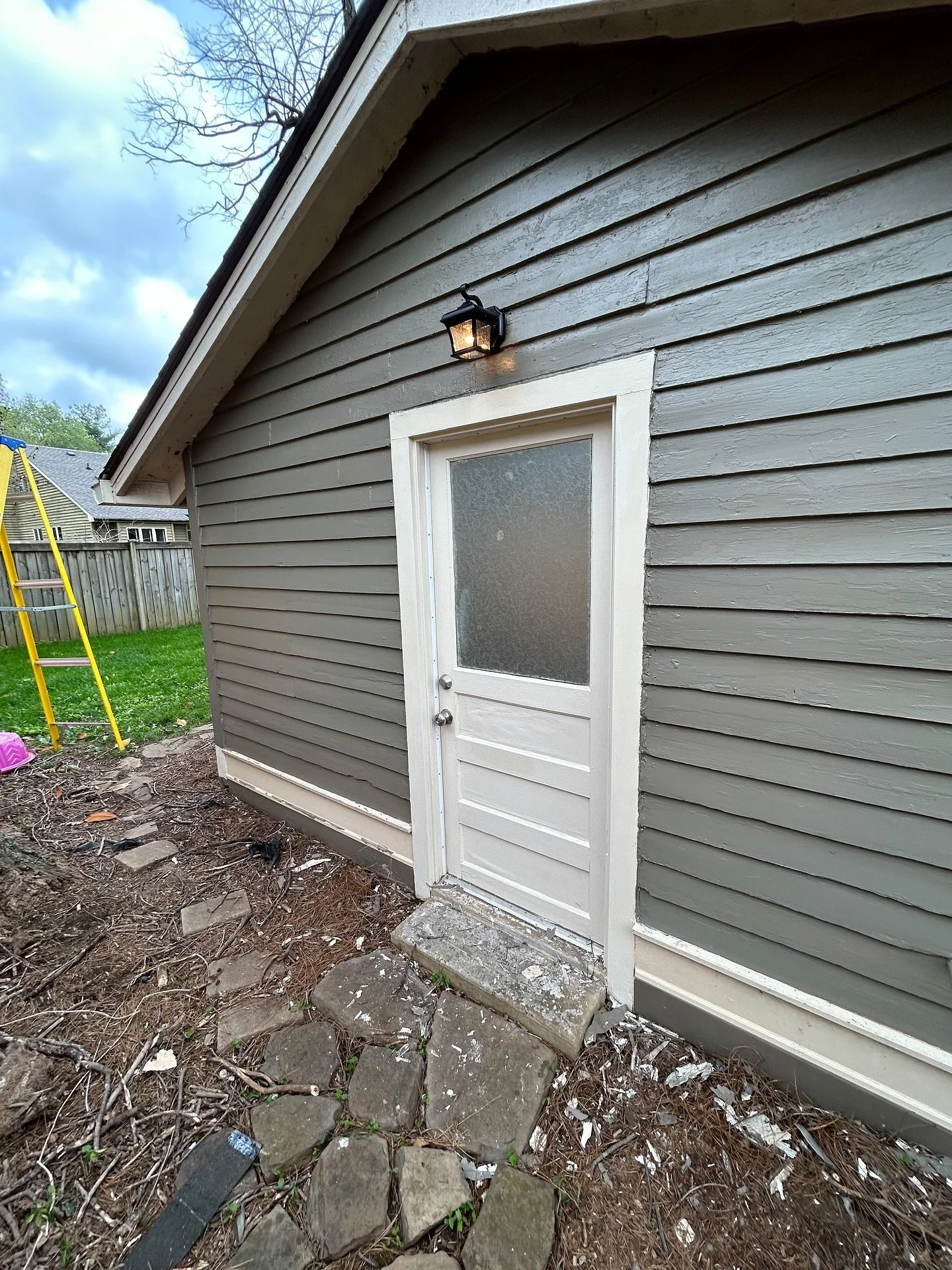 Gave this door and siding an updated look with a fresh coat of paint! Swipe for the before 

#exteriorpainting #homerenovating #housepainting