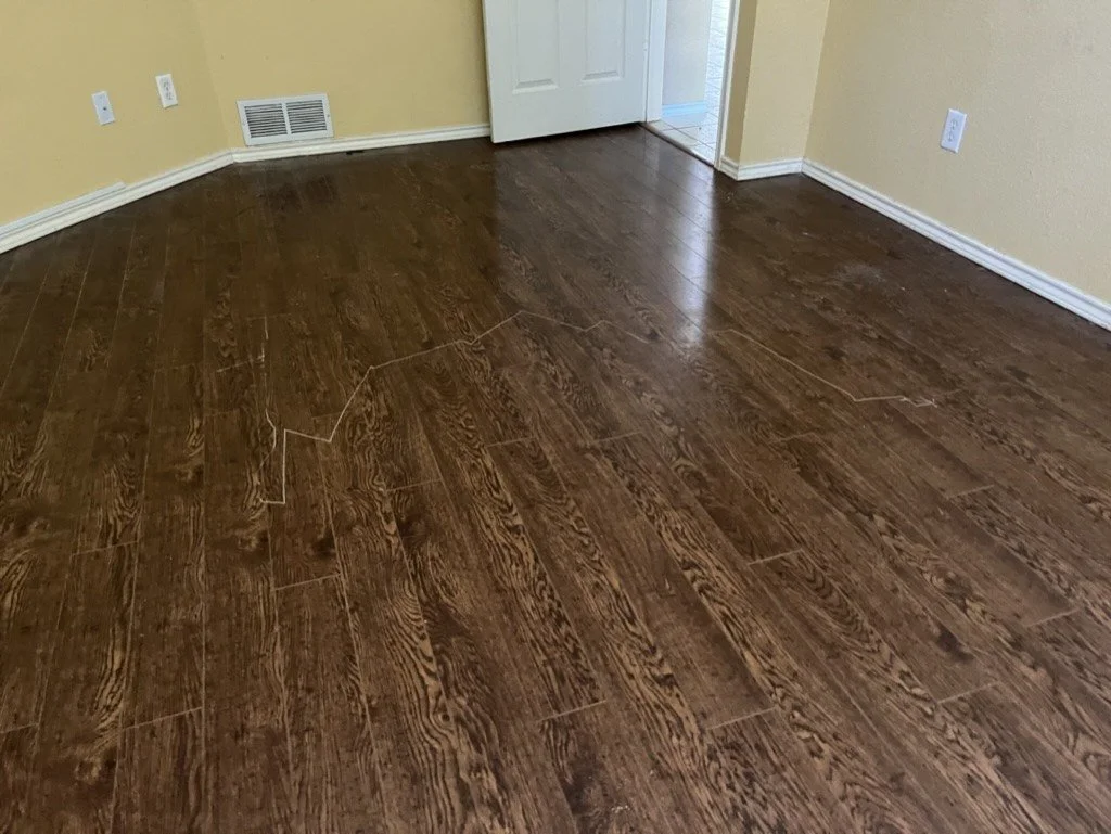 Dark stained hardwood floor installation