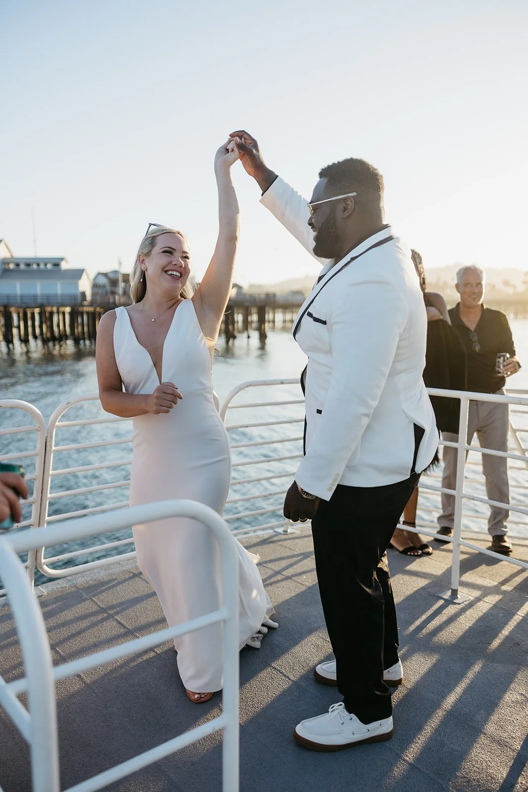 Bride and Groom dancing on a catamaran in the Santa Barbara harbor