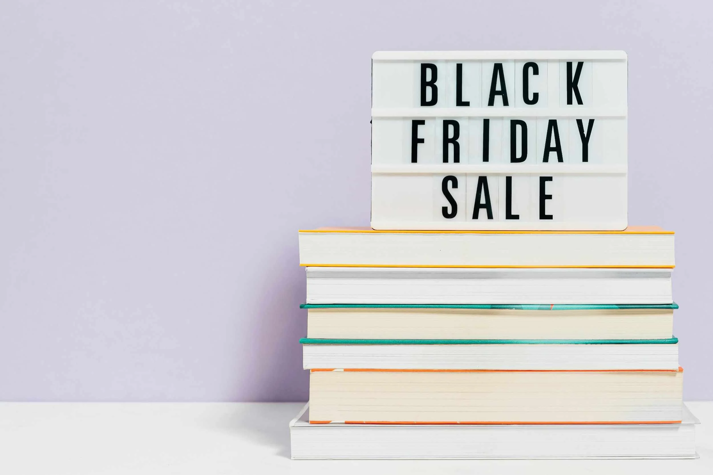 pile of books on Black Friday early deals