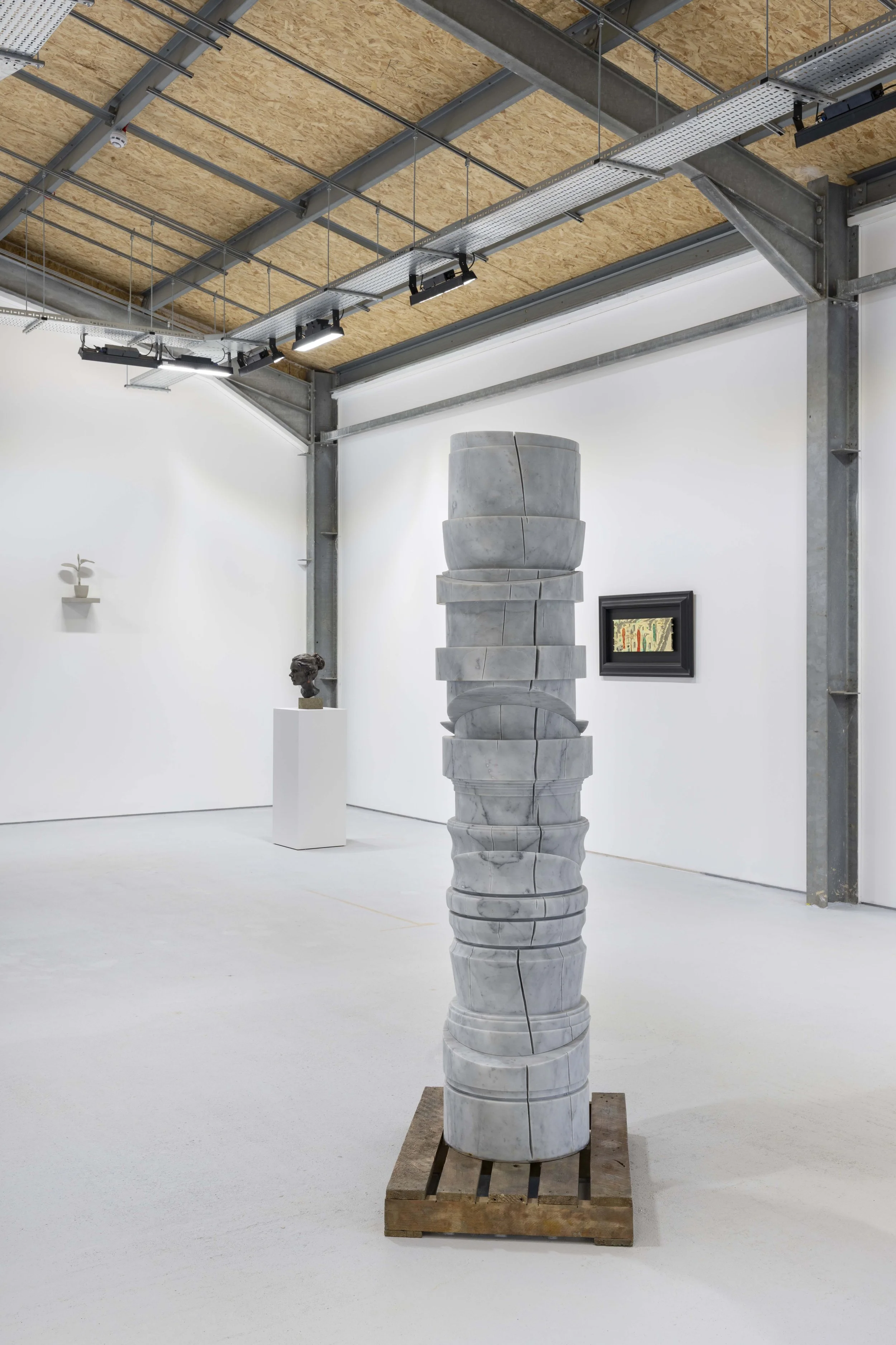 Simon Allison, Shifted Functionality, 2025. Carrara marble, bronze, 195 x 60 x 60cm.