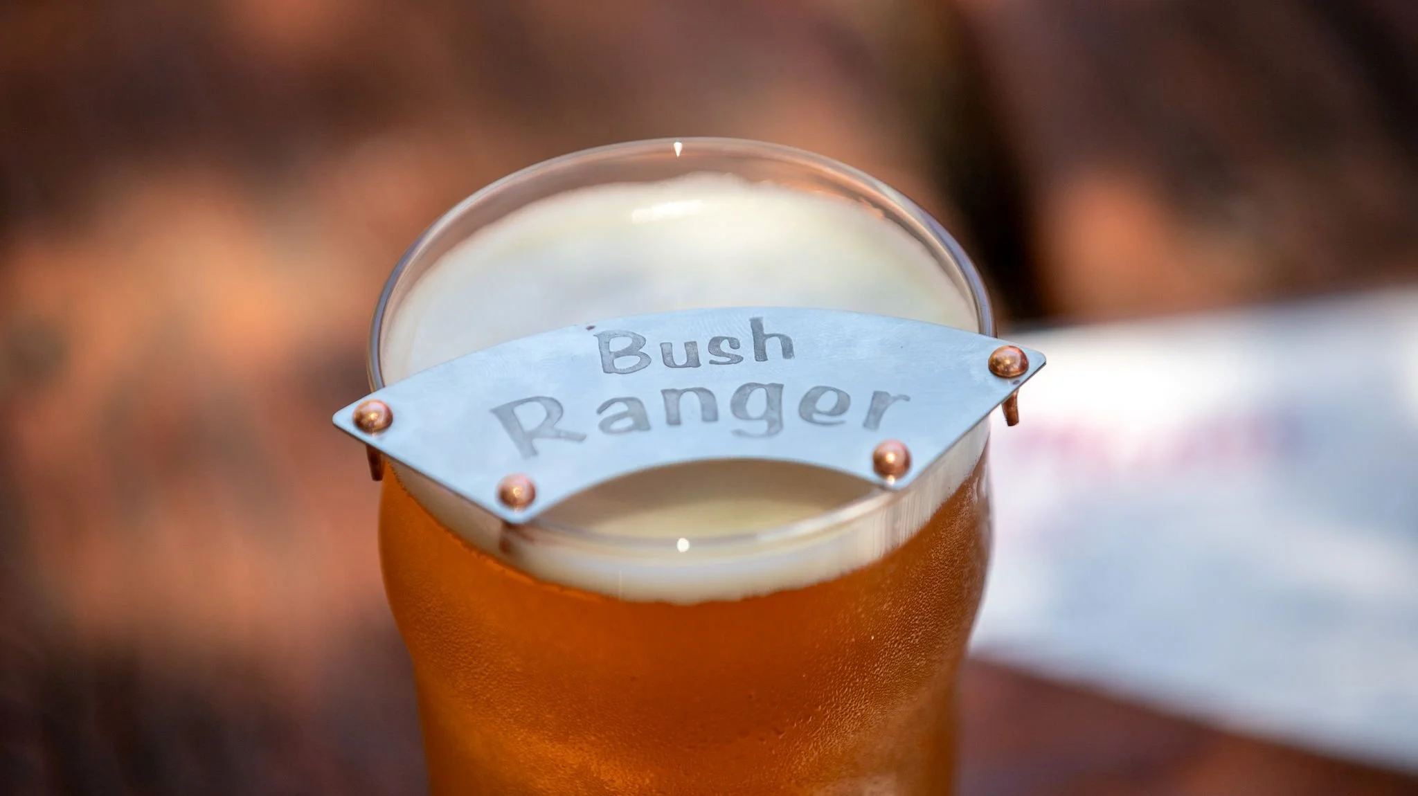 TiMelly bush ranger moustache protector on an ice cold pint of beer.jpg