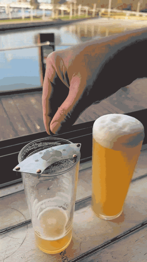 Bush Ranger moustache guard being used on a frothy pint of beer from our viral tiktok video.gif.gif