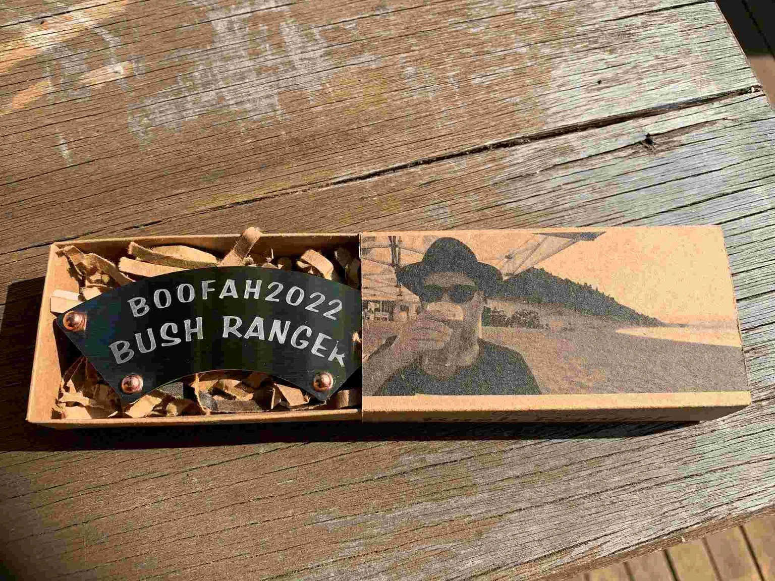 Custom bush ranger moustache guard in box.