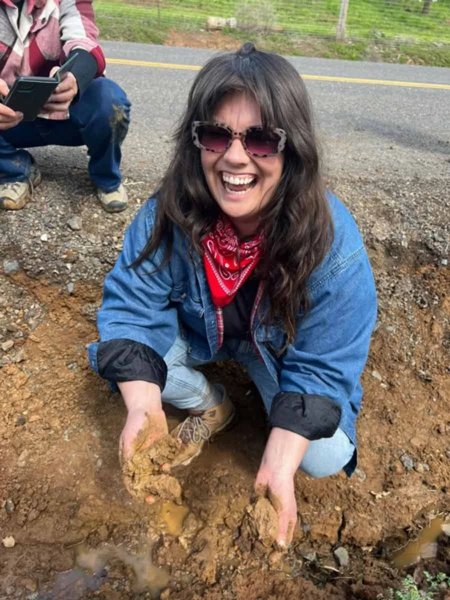 woman-playing-in-mud.jpg