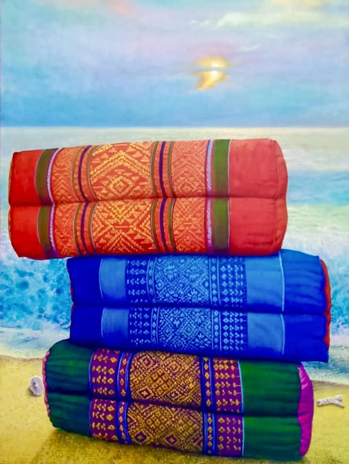 Three Kit pillows facing the beach.jpg